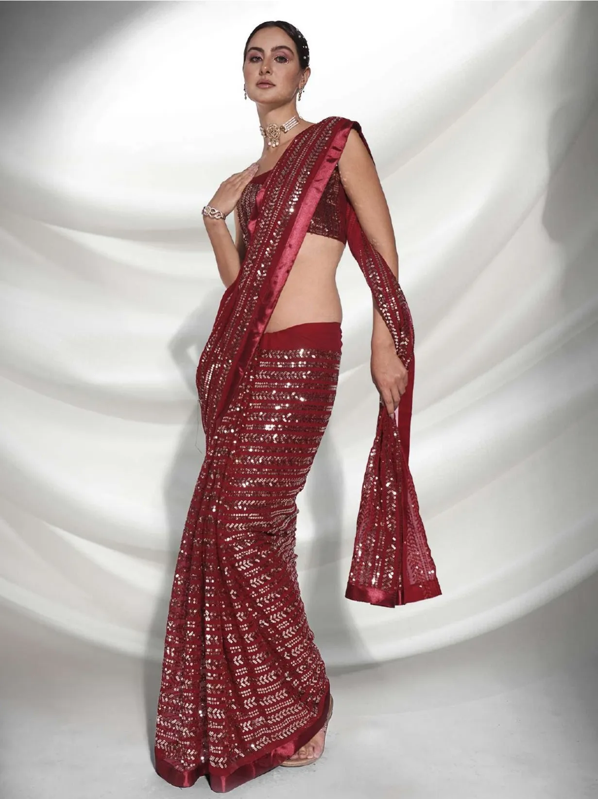 Women Party Wear Designer Sequence Worked Maroon Colour Georgette Saree Collection