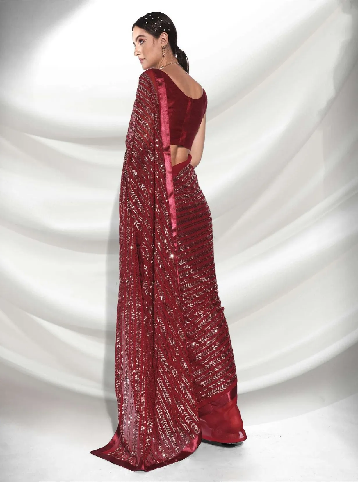 Women Party Wear Designer Sequence Worked Maroon Colour Georgette Saree Collection
