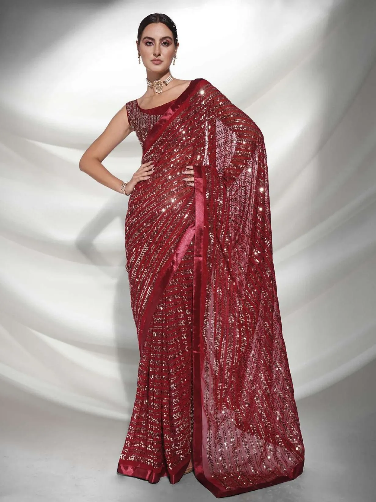 Women Party Wear Designer Sequence Worked Maroon Colour Georgette Saree Collection
